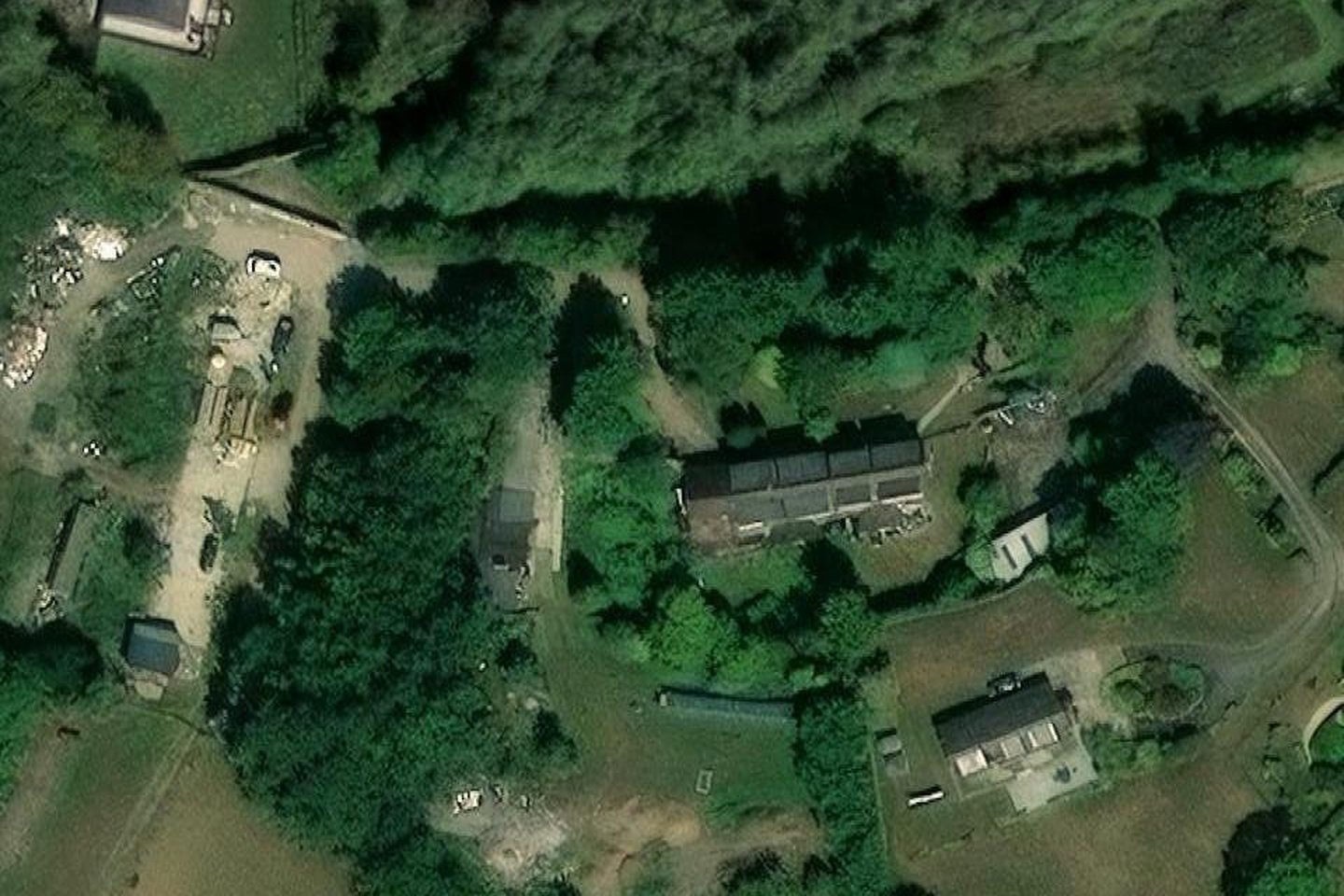 Aerial view of 4 Fort Cottages, Westerham Hill, Westerham TN16 2ED, showing the house, the workshop buildings and the yard